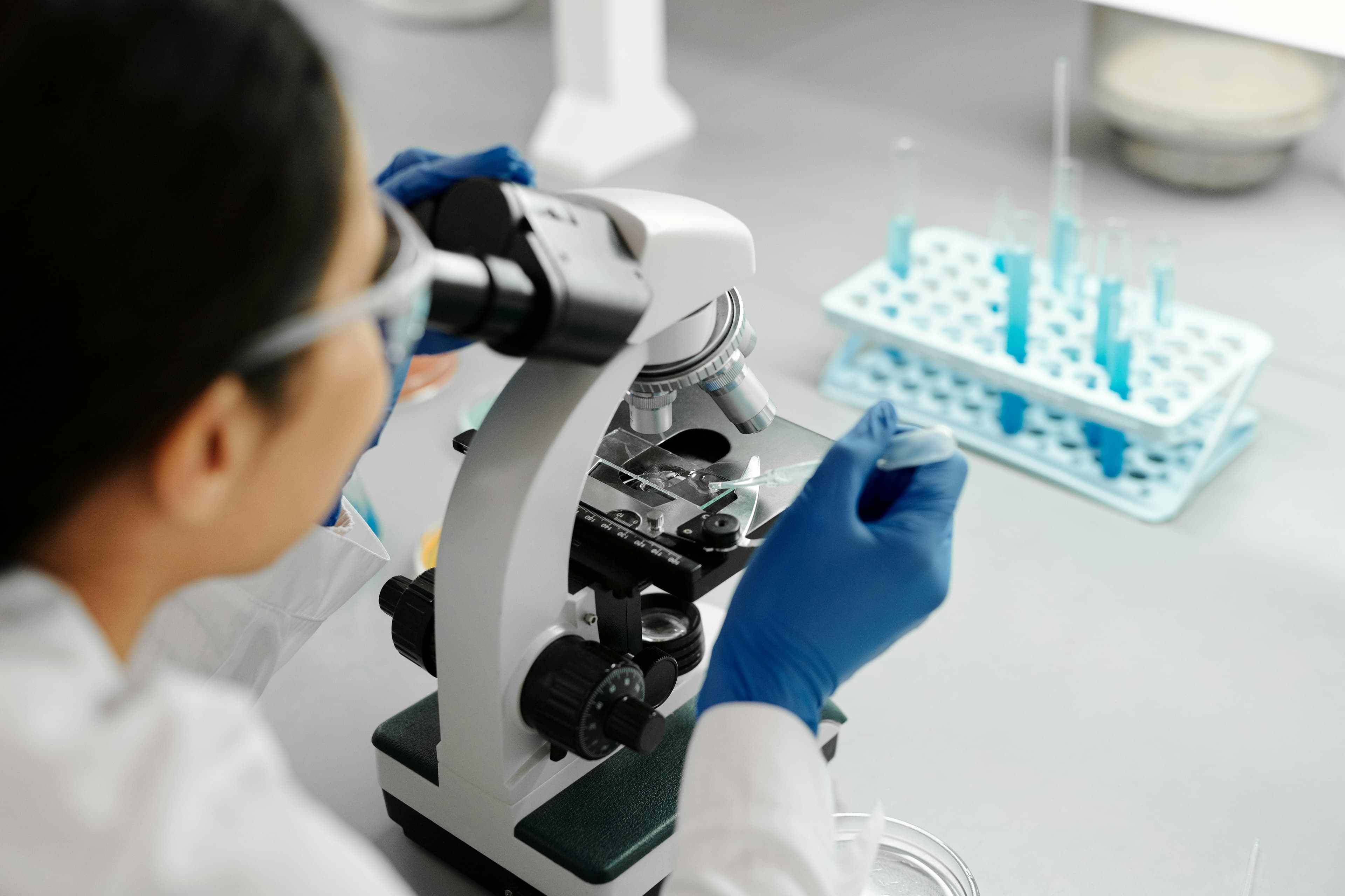 A lady doing research in a Lab.