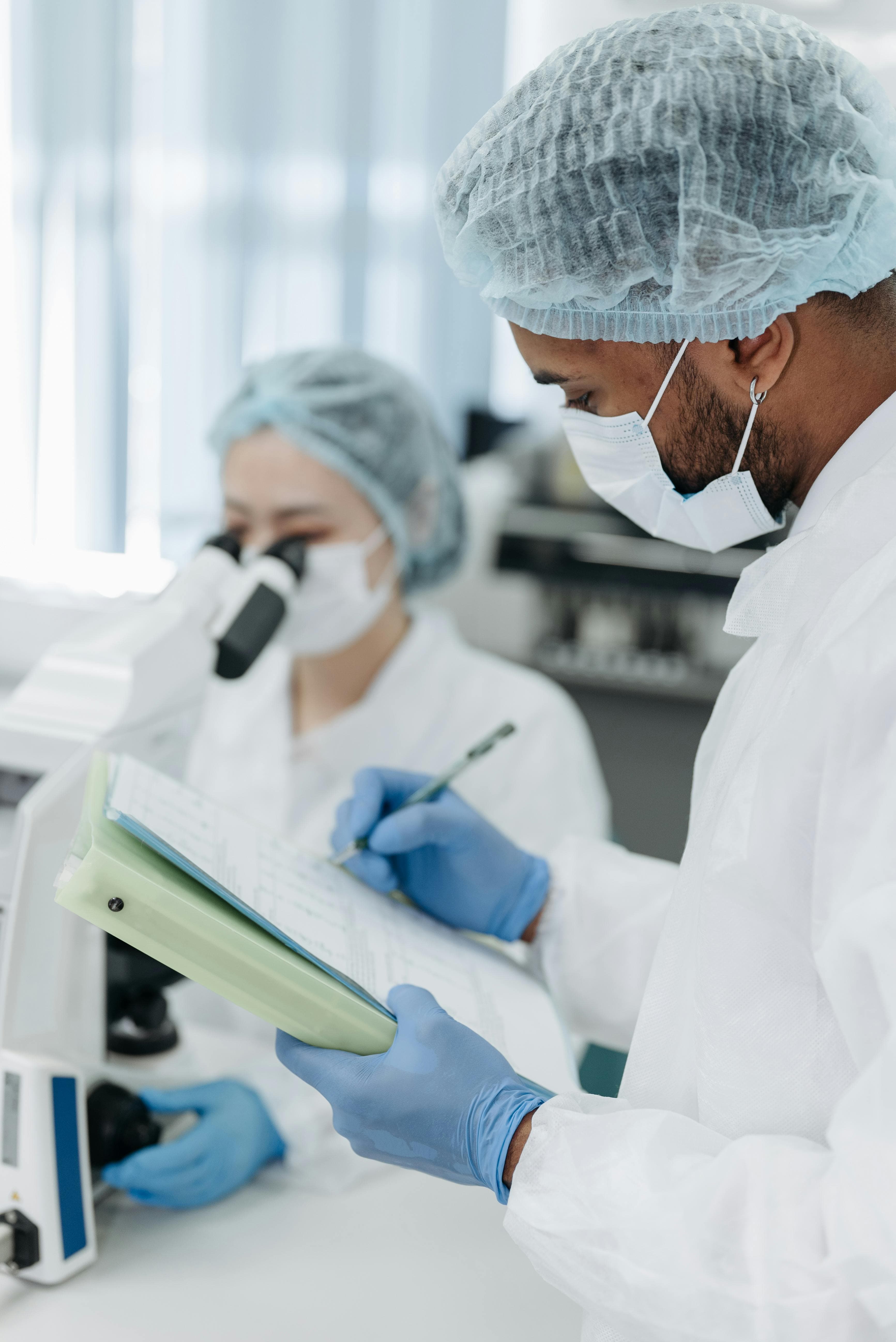 An image of an Lady lab excutive performing test on sample.